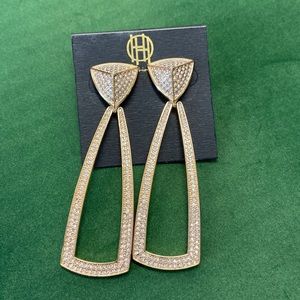 House of Harlow dangle earrings